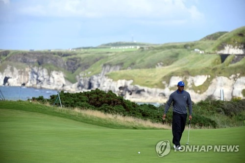 “파3 16번 홀 조심”…타이거 우즈, 디오픈 앞두고 출전자에 조언 / 연합뉴스